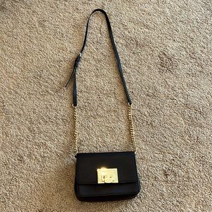 MICHAEL Michael Kors Black Mini Bag with Gold Accents
